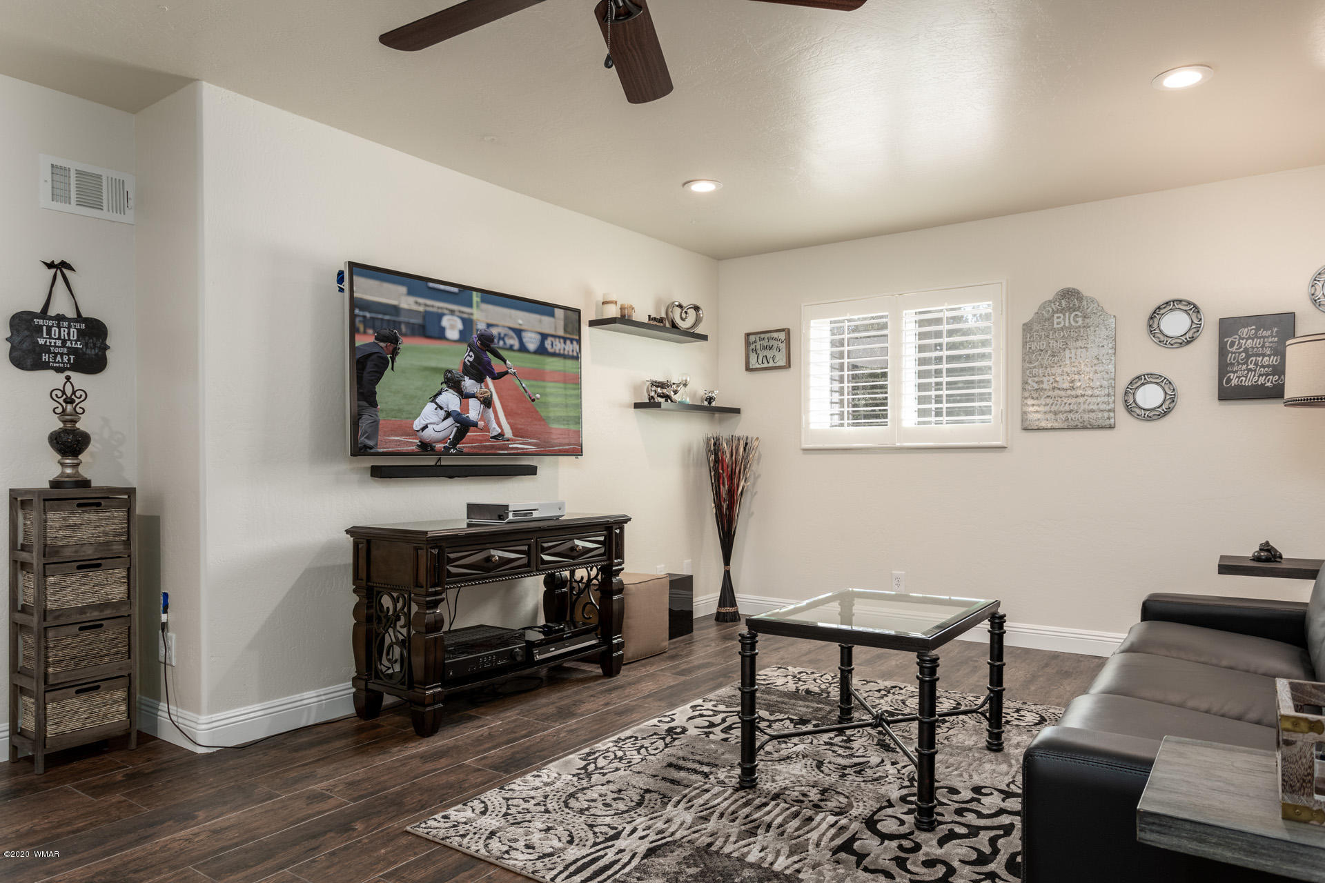 2974 Ranch House Road Overgaard, AZ 85933 - Photo 42 of 46 a living room with furniture and a flat screen tv