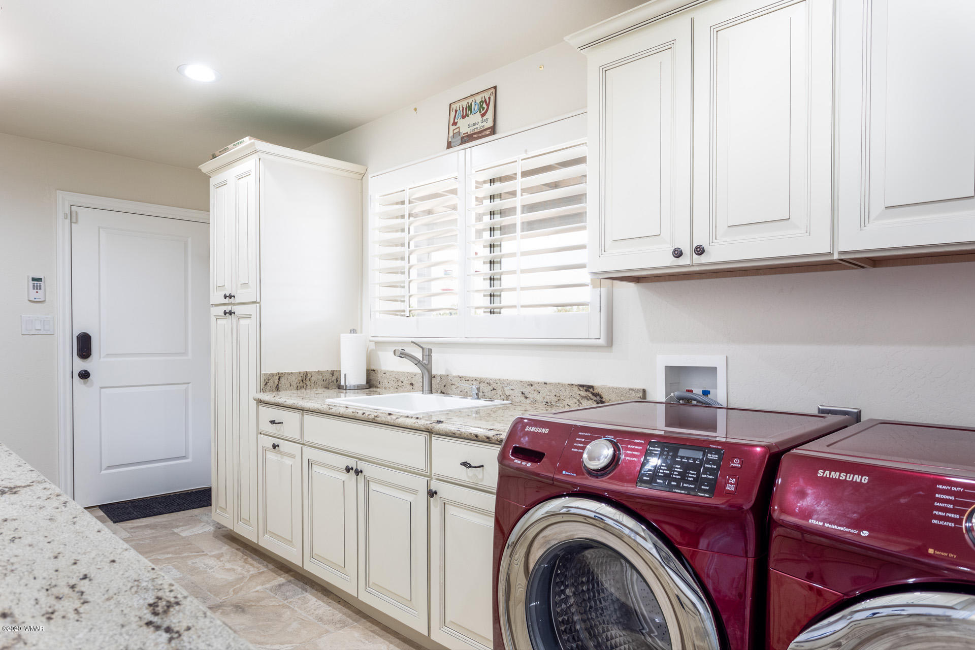 2974 Ranch House Road Overgaard, AZ 85933 - Photo 44 of 46 a utility room with sink dryer and washer