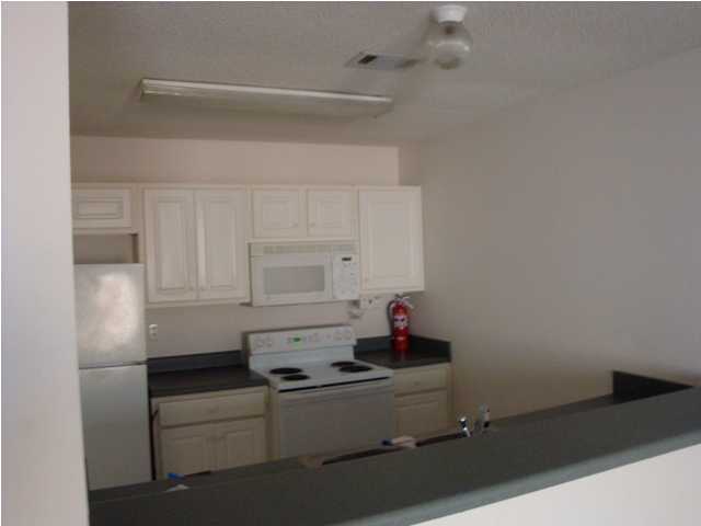 514 Keystone Road, Unit 514 Mary Esther, FL 32569 - Photo 2 of 10 a room with storage and utility