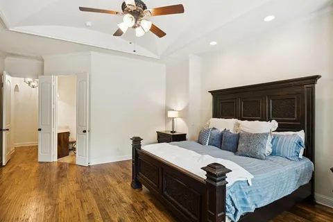 a spacious bathroom with a double vanity sink and a mirror
