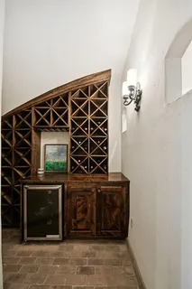 a dining table with chairs and wooden floor