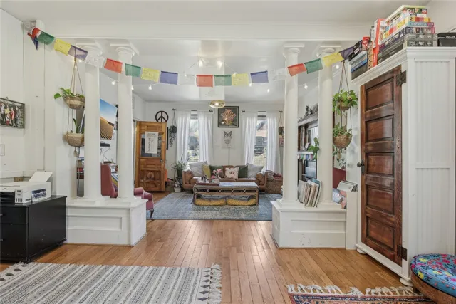 a kitchen with a stove and a refrigerator