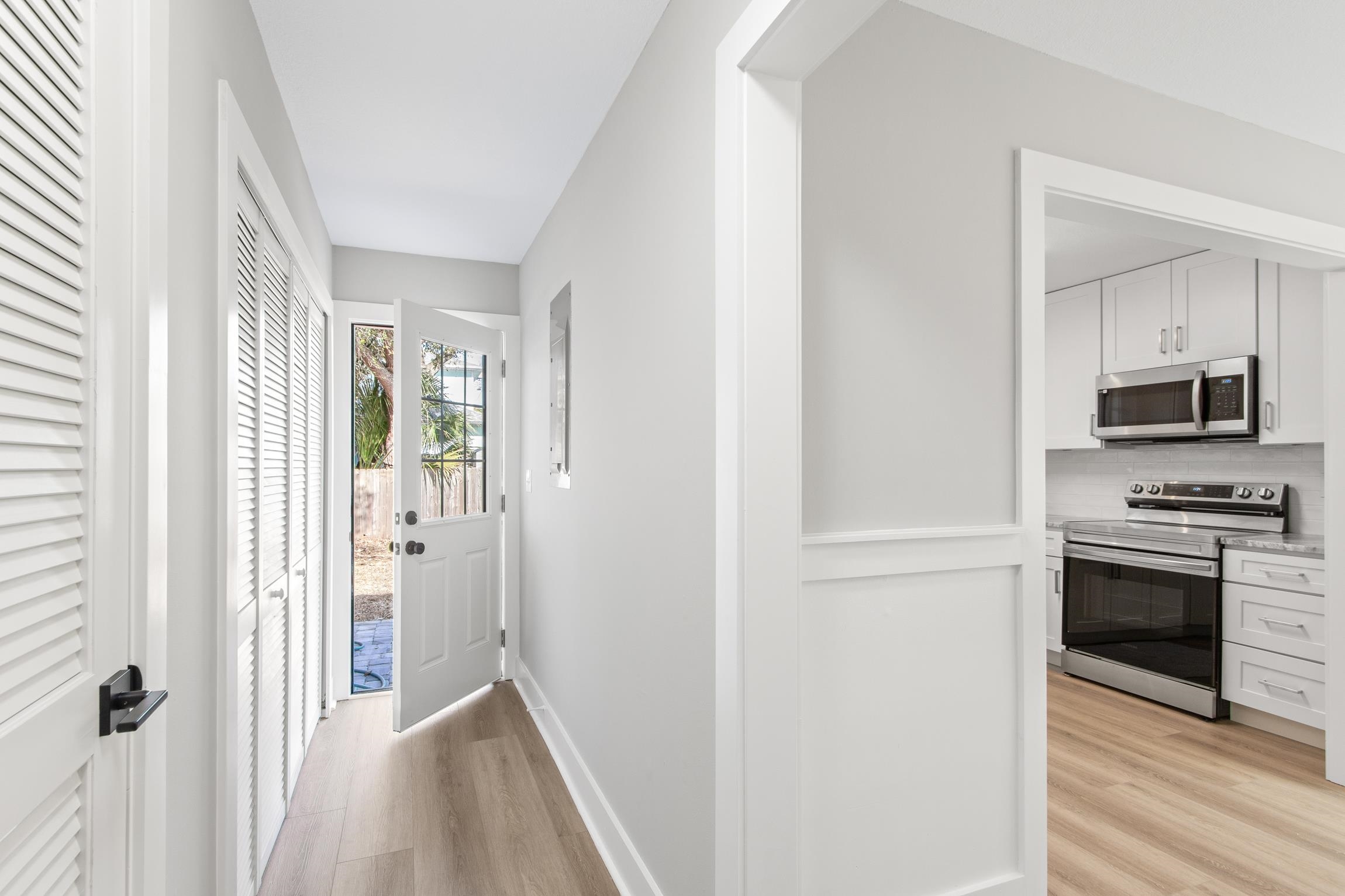 112 2nd Street St. Augustine, FL 32080 - Photo 16 of 49 a view of a kitchen from a hallway