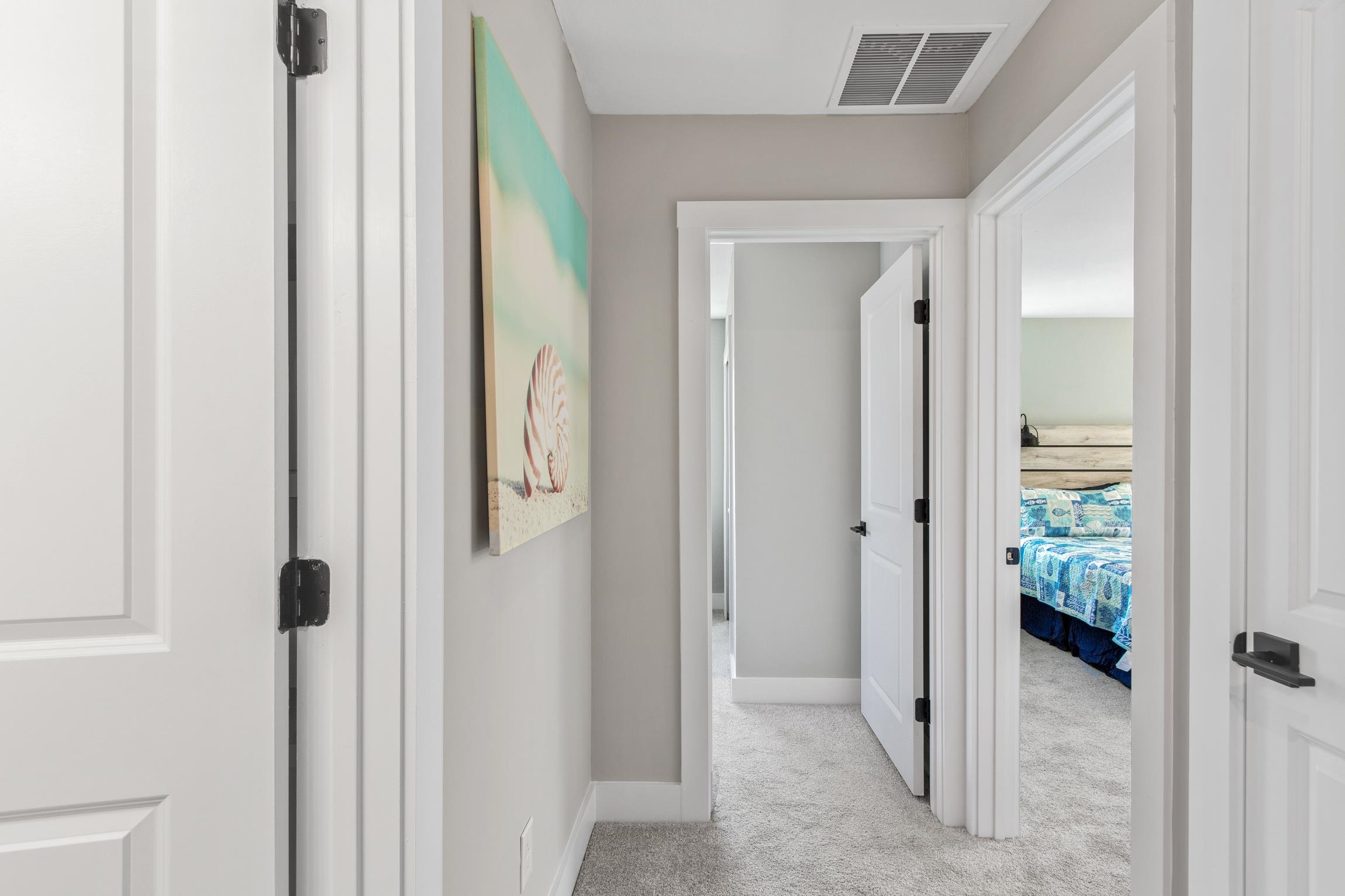 112 2nd Street St. Augustine, FL 32080 - Photo 19 of 49 a view of a hallway with wooden floor and closet