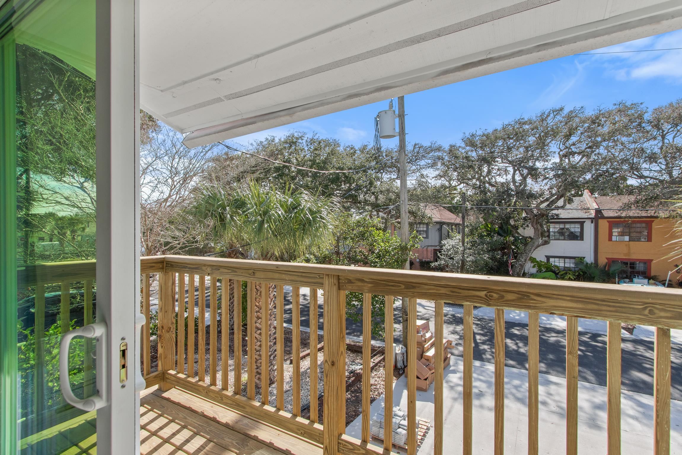 112 2nd Street St. Augustine, FL 32080 - Photo 26 of 49 a view of a street from a balcony