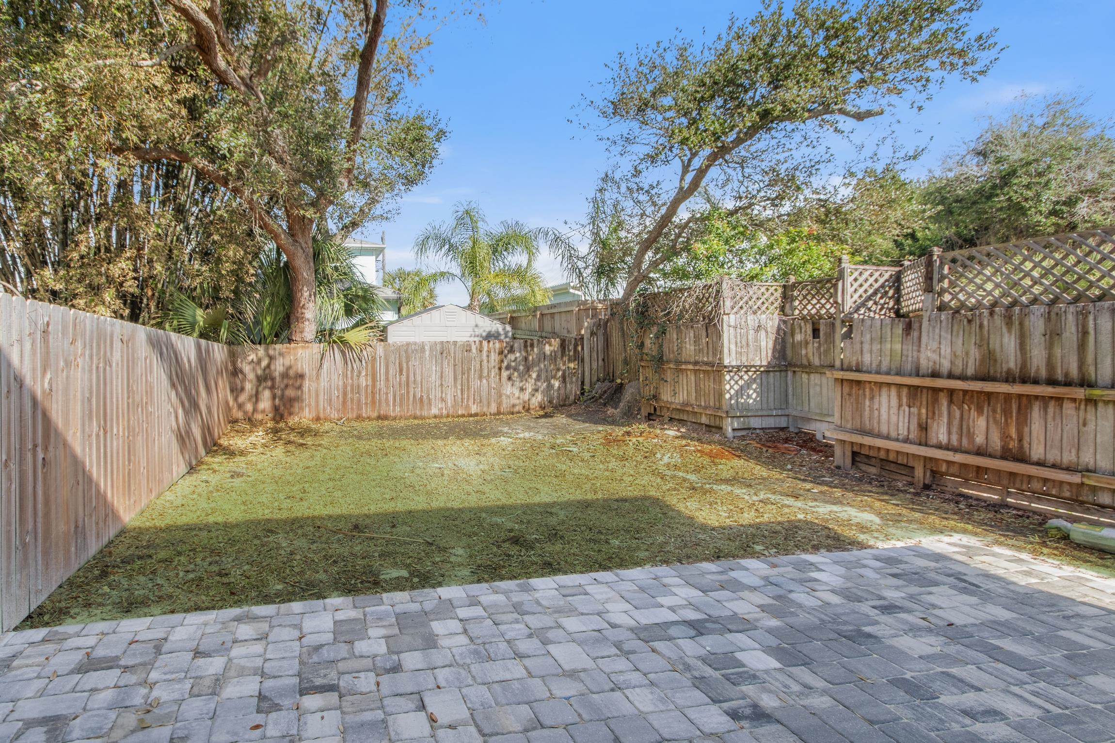 112 2nd Street St. Augustine, FL 32080 - Photo 31 of 49 a view of a back yard of the house