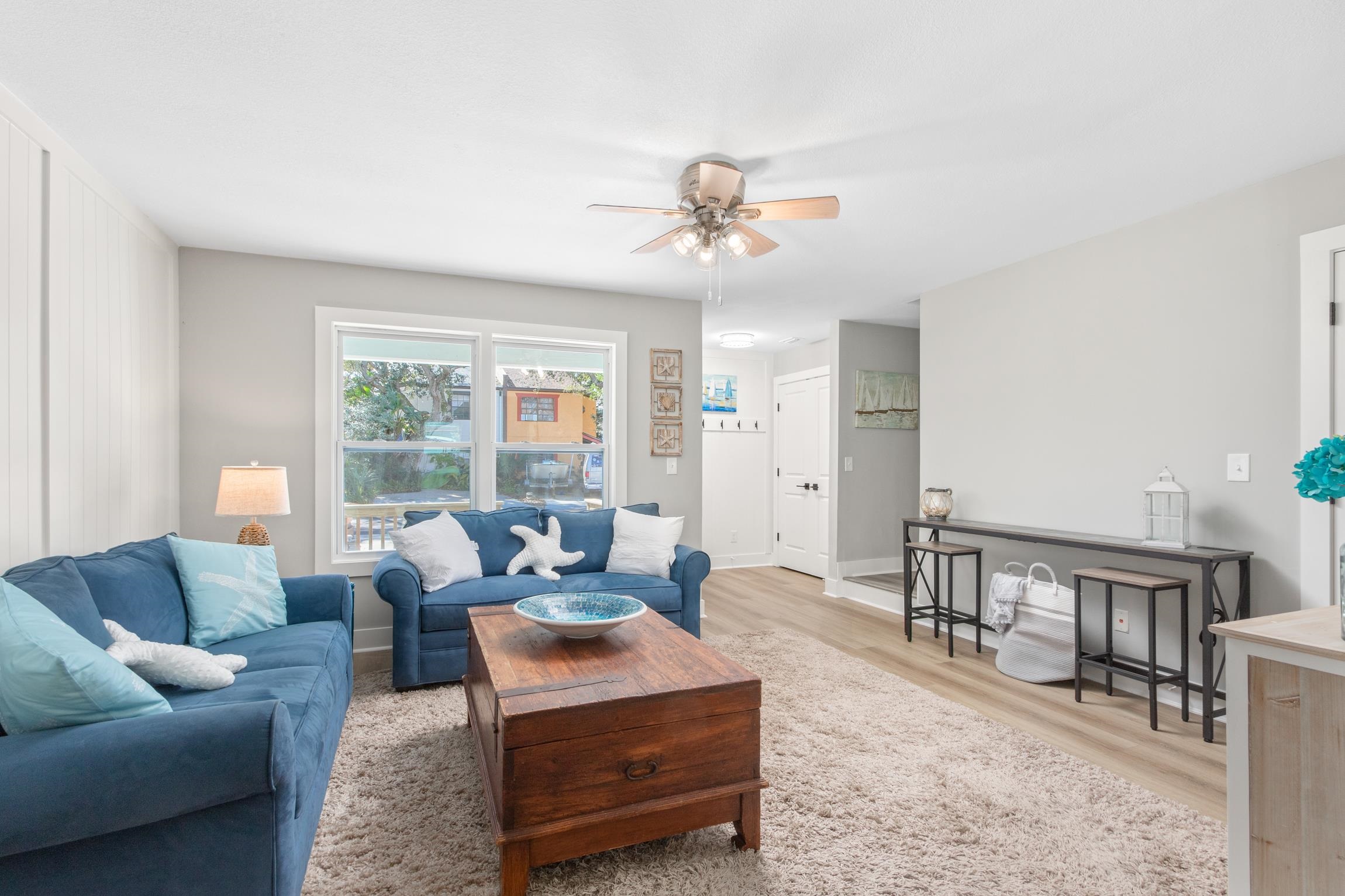 112 2nd Street St. Augustine, FL 32080 - Photo 9 of 49 a living room with furniture and a table