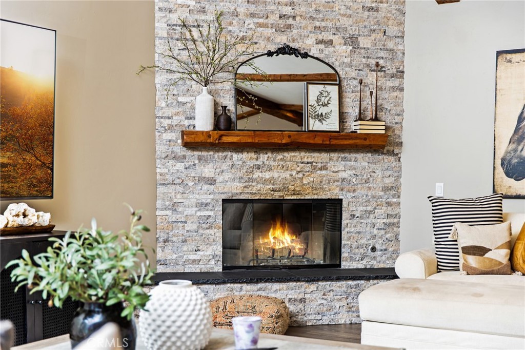 4007 Ladera Vista Road Fallbrook, CA 92028 - Photo 12 of 64 a living room with furniture and a fireplace