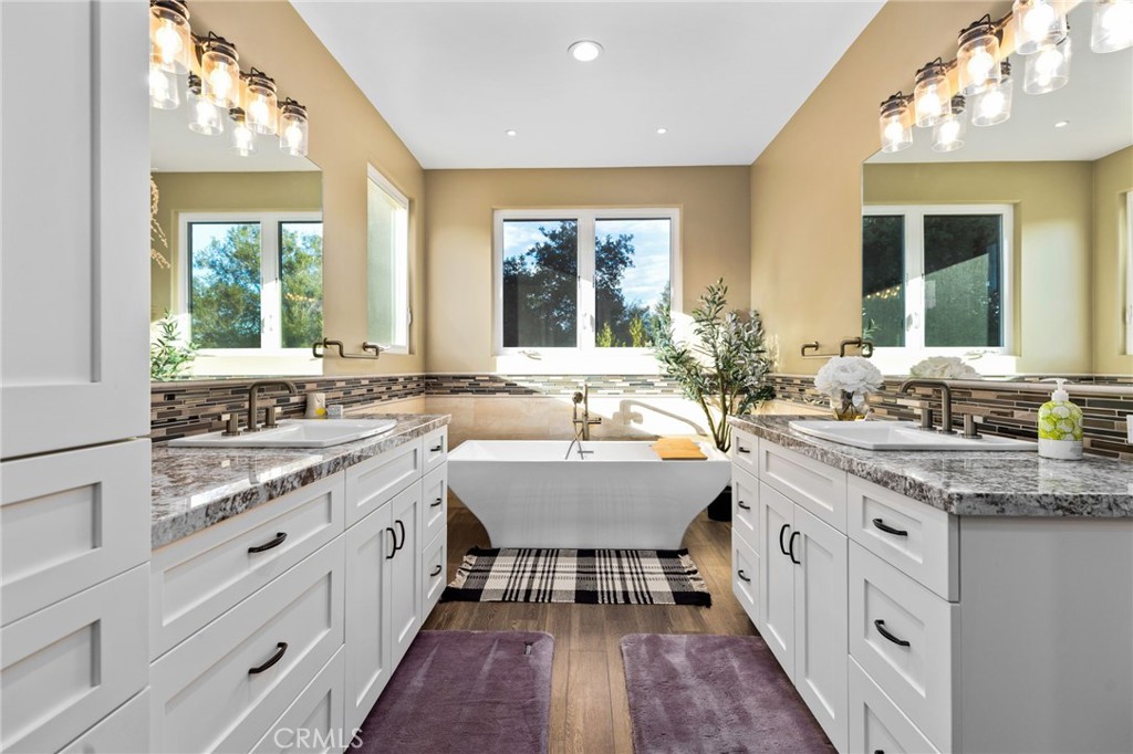4007 Ladera Vista Road Fallbrook, CA 92028 - Photo 19 of 64 a large white kitchen with a large window