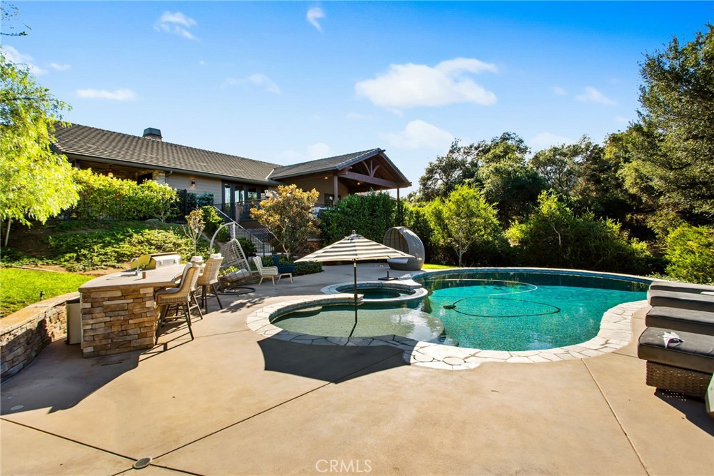 4007 Ladera Vista Road Fallbrook, CA 92028 - Photo 33 of 64 a swimming pool with outdoor seating yard and barbeque oven