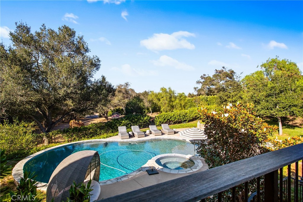 4007 Ladera Vista Road Fallbrook, CA 92028 - Photo 37 of 64 a view of swimming pool from a balcony