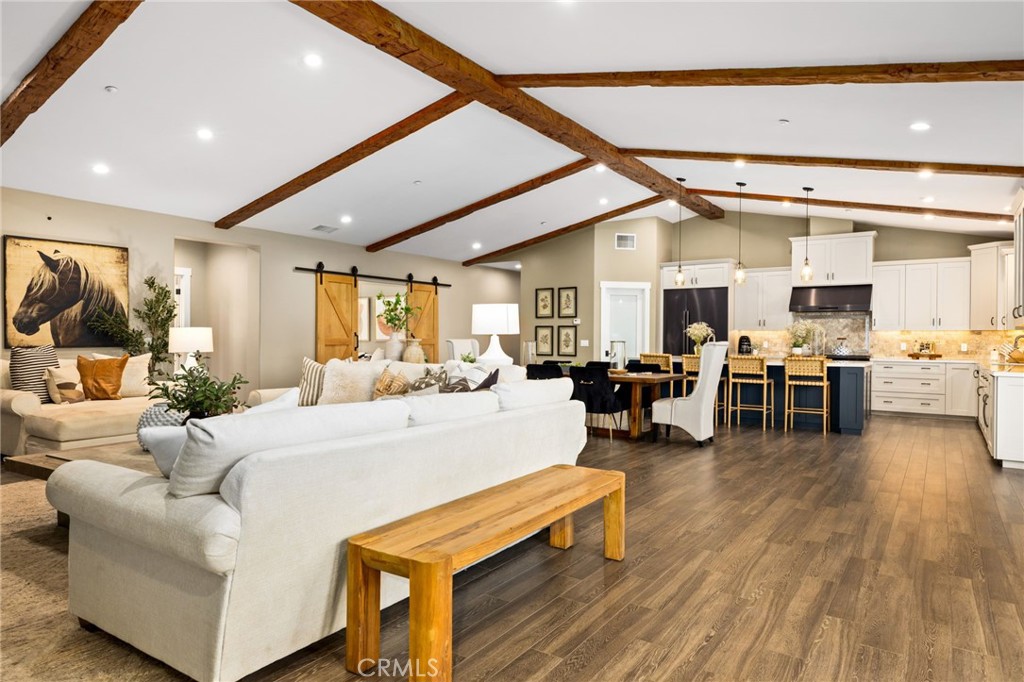 4007 Ladera Vista Road Fallbrook, CA 92028 - Photo 9 of 64 a living room with lots of furniture and kitchen view