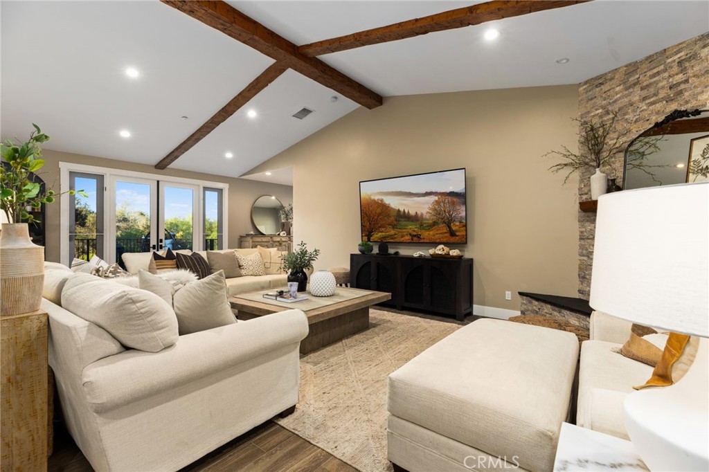 4007 Ladera Vista Road Fallbrook, CA 92028 - Photo 10 of 64 a living room with furniture and a flat screen tv