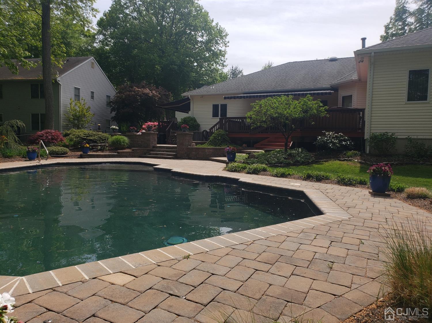 41 Dundee Road Kendall Park, NJ 08824 - Photo 12 of 42 a view of a house with backyard and sitting area