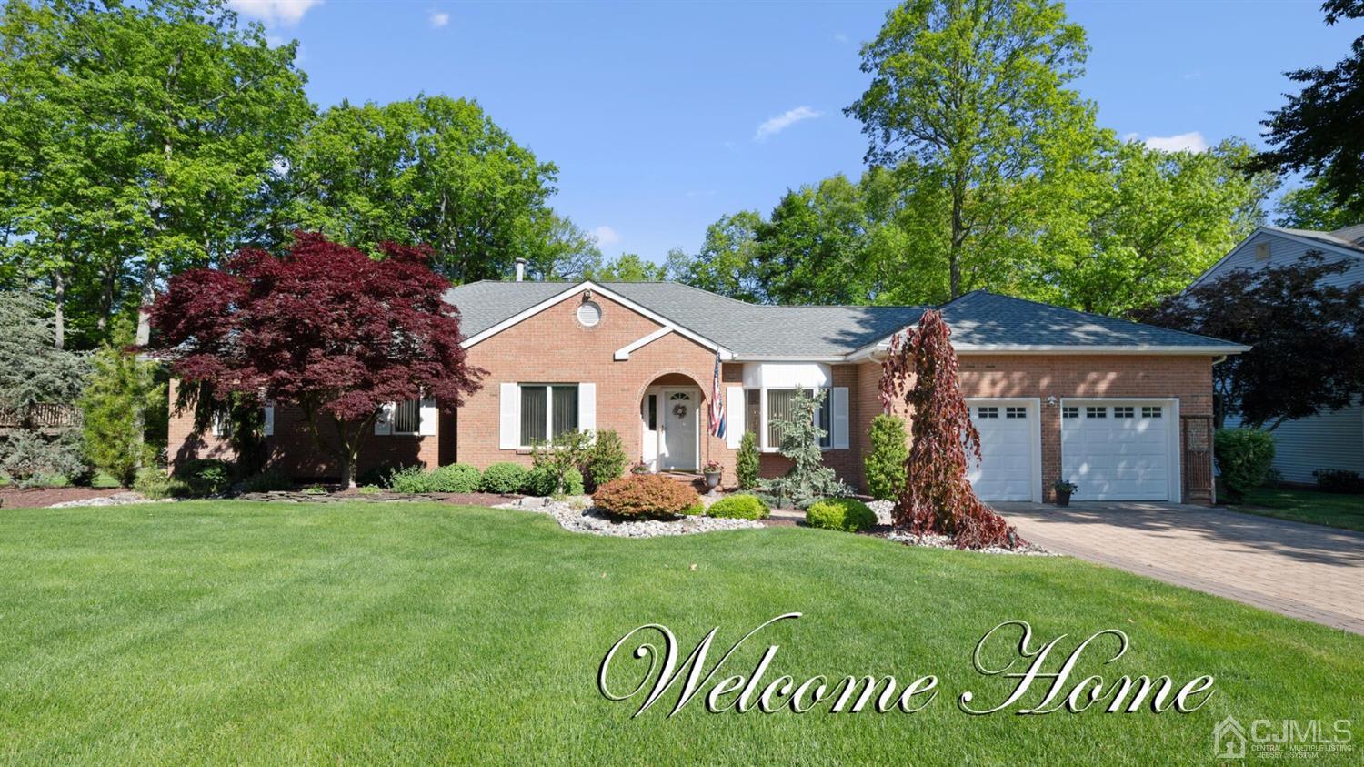 41 Dundee Road Kendall Park, NJ 08824 - Photo 18 of 42 a front view of a house with garden
