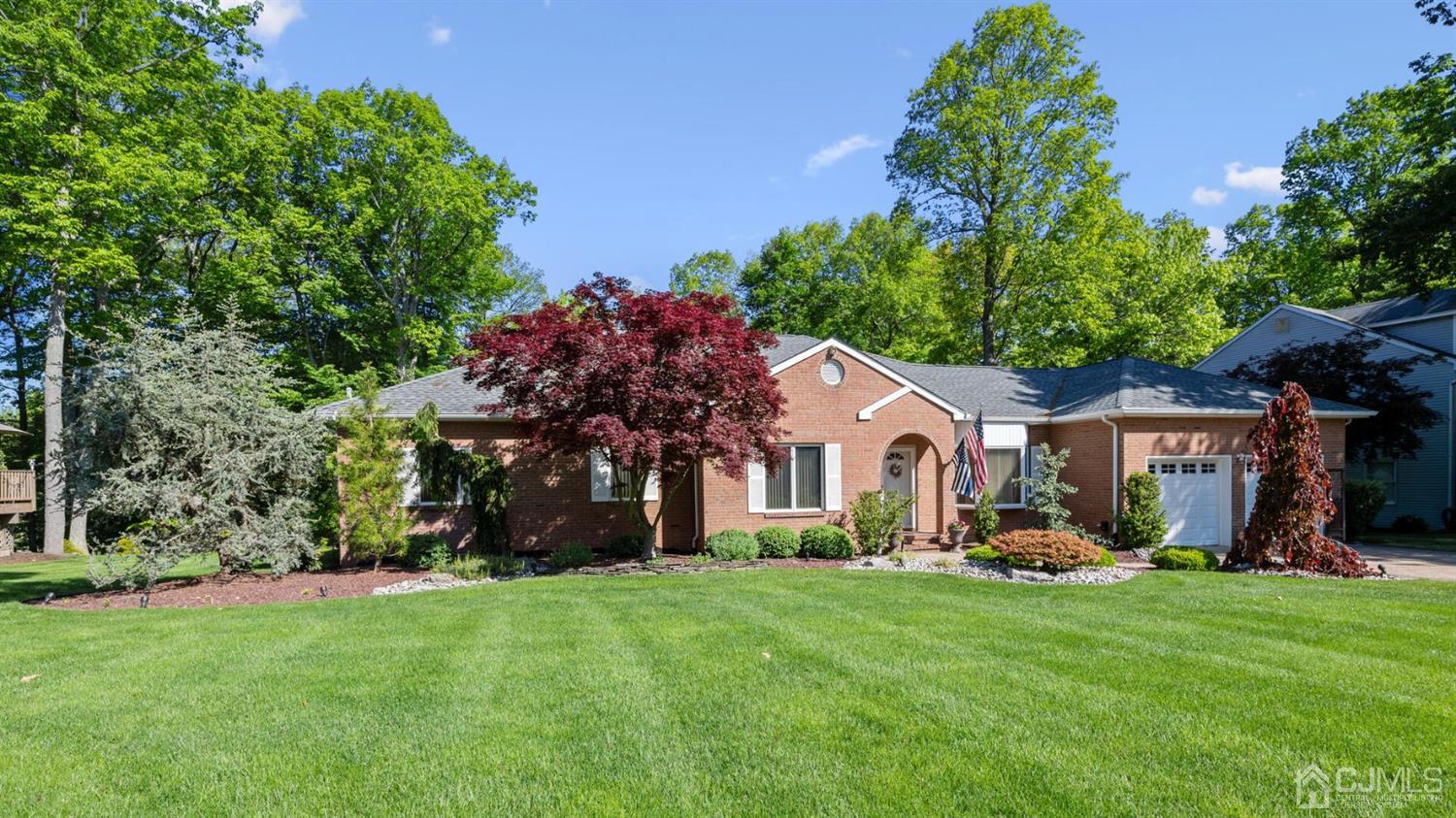 41 Dundee Road Kendall Park, NJ 08824 - Photo 20 of 42 a front view of house with yard and green space