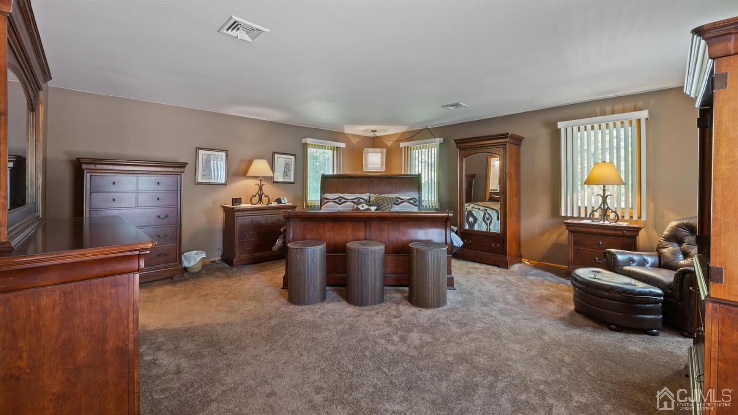 41 Dundee Road Kendall Park, NJ 08824 - Photo 24 of 42 a living room with furniture a window and a kitchen view