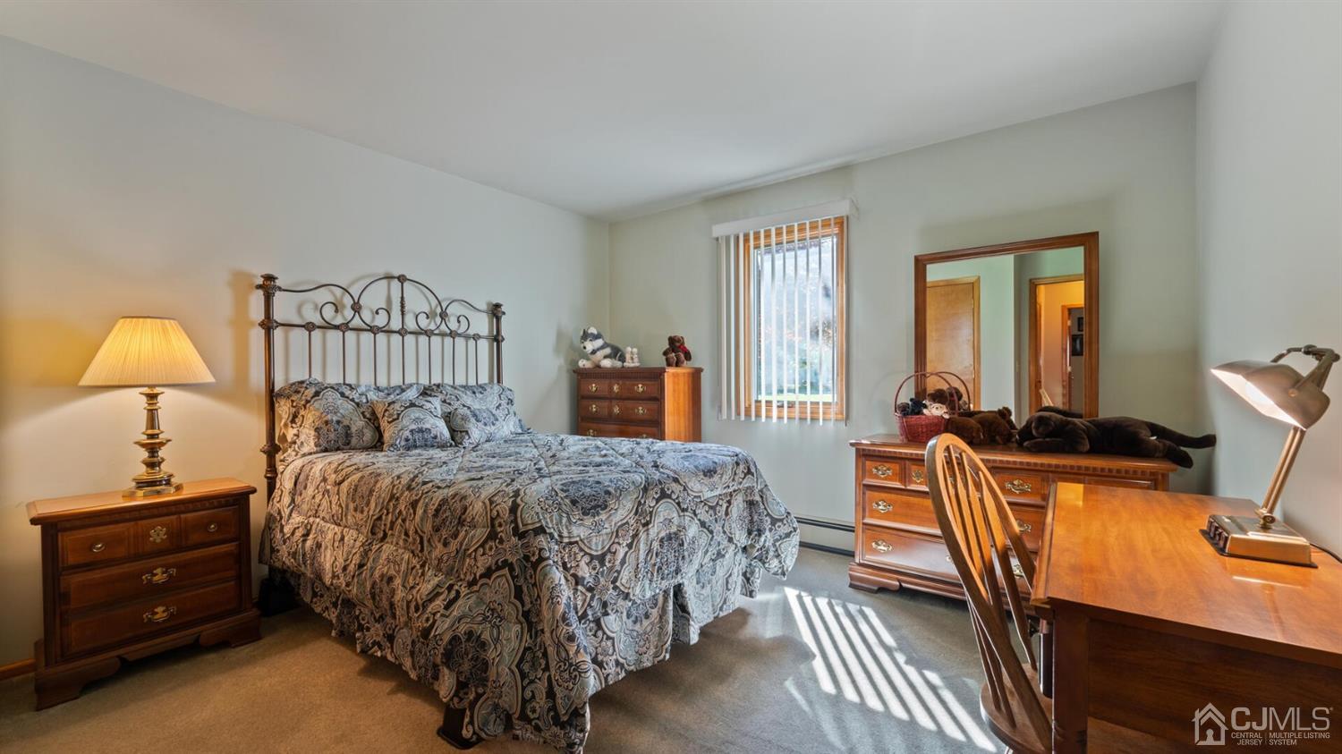 41 Dundee Road Kendall Park, NJ 08824 - Photo 29 of 42 a bedroom with bed and a window