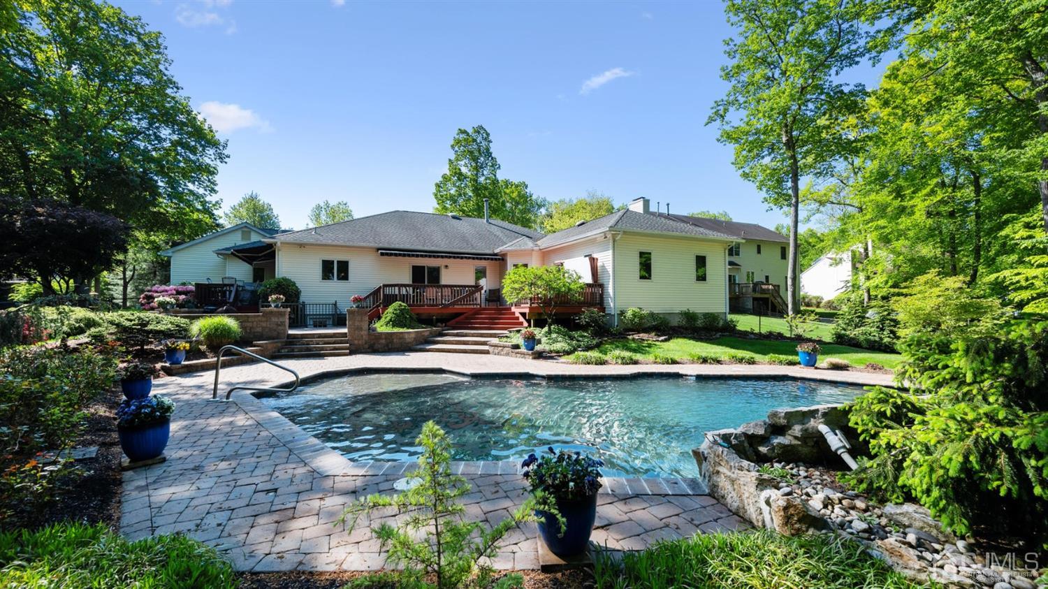 41 Dundee Road Kendall Park, NJ 08824 - Photo 40 of 42 a front view of a house with garden