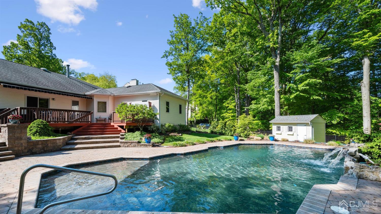 41 Dundee Road Kendall Park, NJ 08824 - Photo 41 of 42 a front view of a house with garden