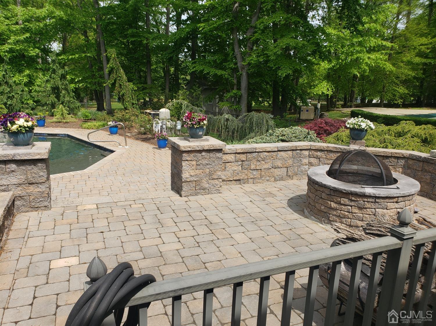 41 Dundee Road Kendall Park, NJ 08824 - Photo 8 of 42 a view of a backyard and sitting area