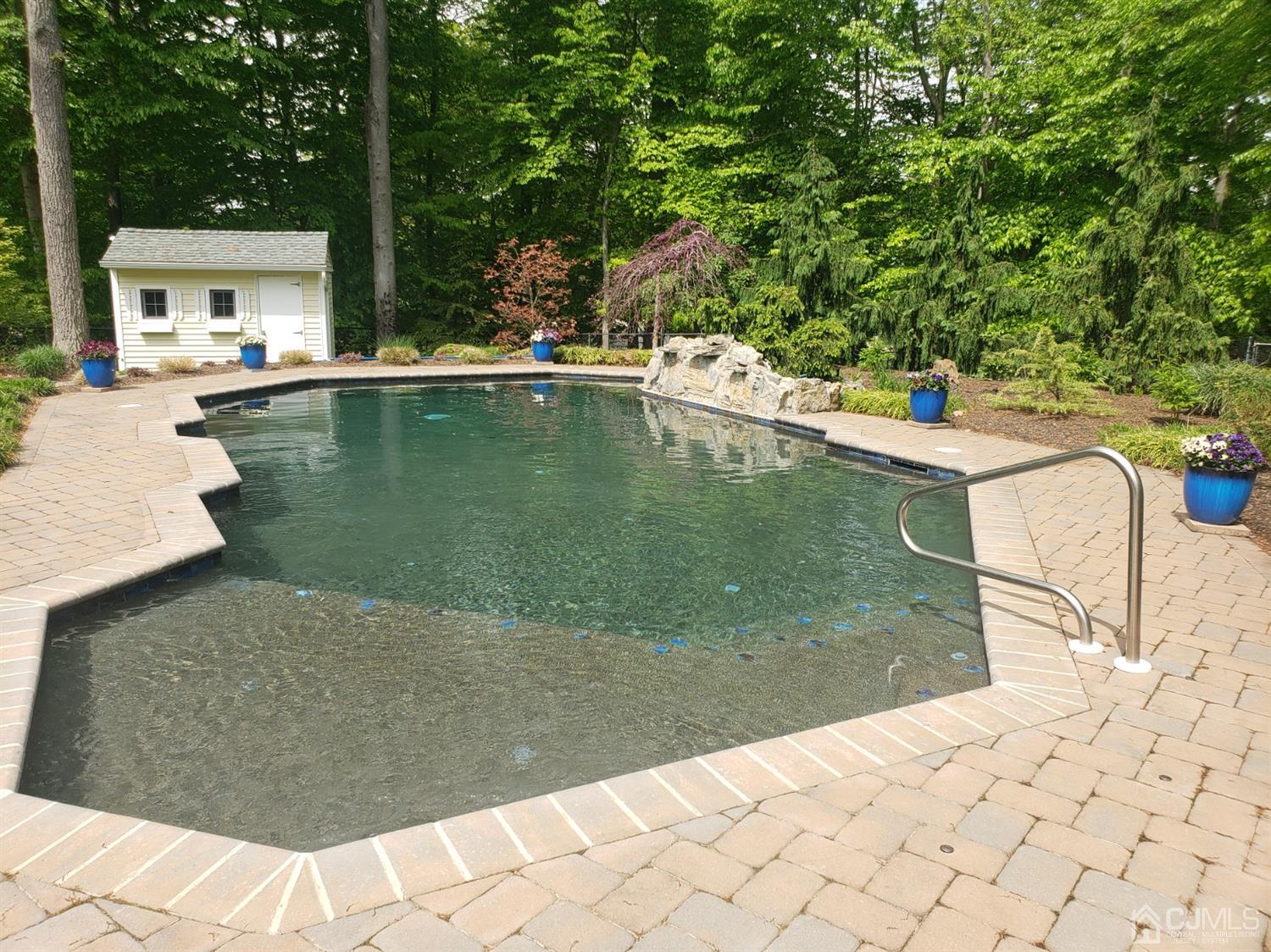 41 Dundee Road Kendall Park, NJ 08824 - Photo 10 of 42 a view of a swimming pool with a yard