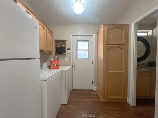 a view of a bathroom from a hallway