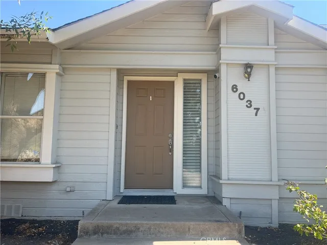 a view of entryway and hall with a window