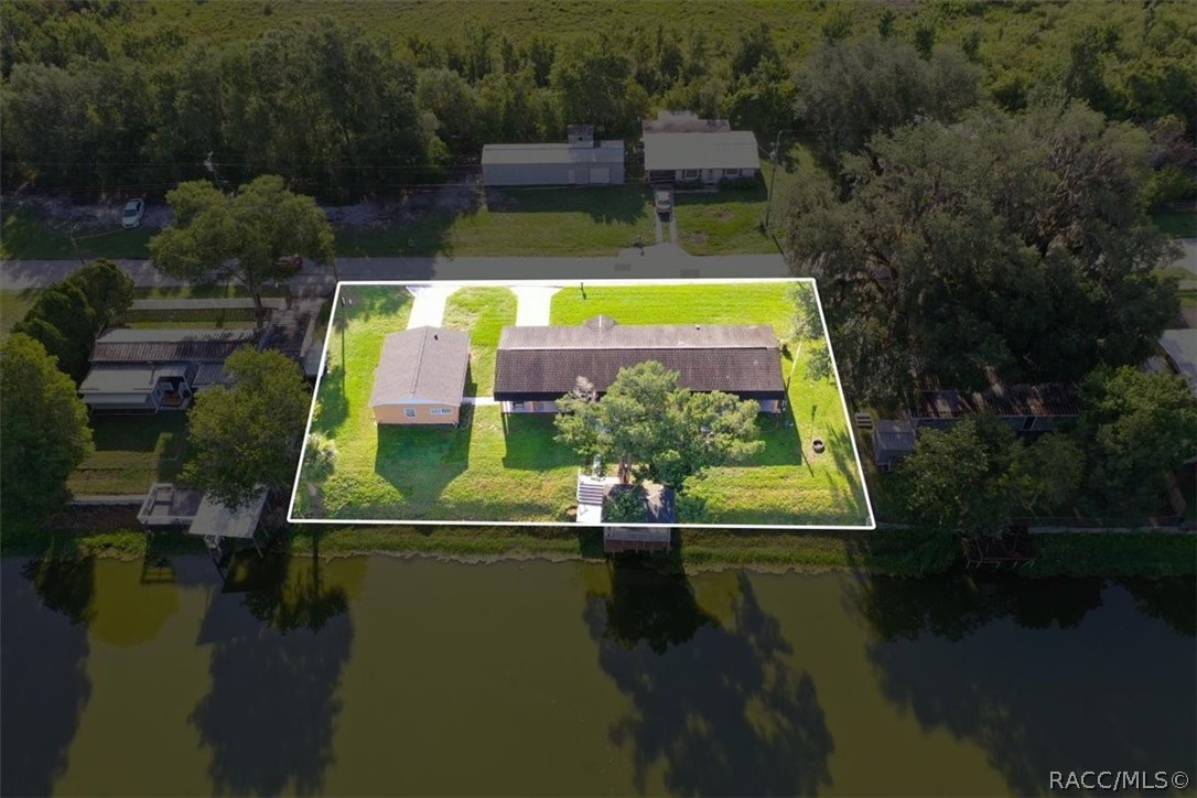 928 South Shad Terrace Inverness, FL 34450 - Photo 42 of 48 aerial view of house with yard swimming pool and outdoor seating