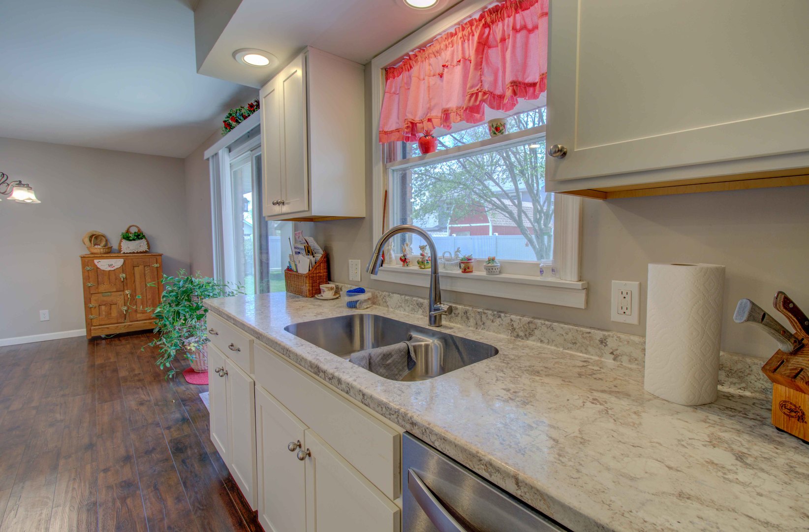 217 Eldorado Drive Tuscola, IL 61953 - Photo 14 of 26 a kitchen with a sink and a refrigerator