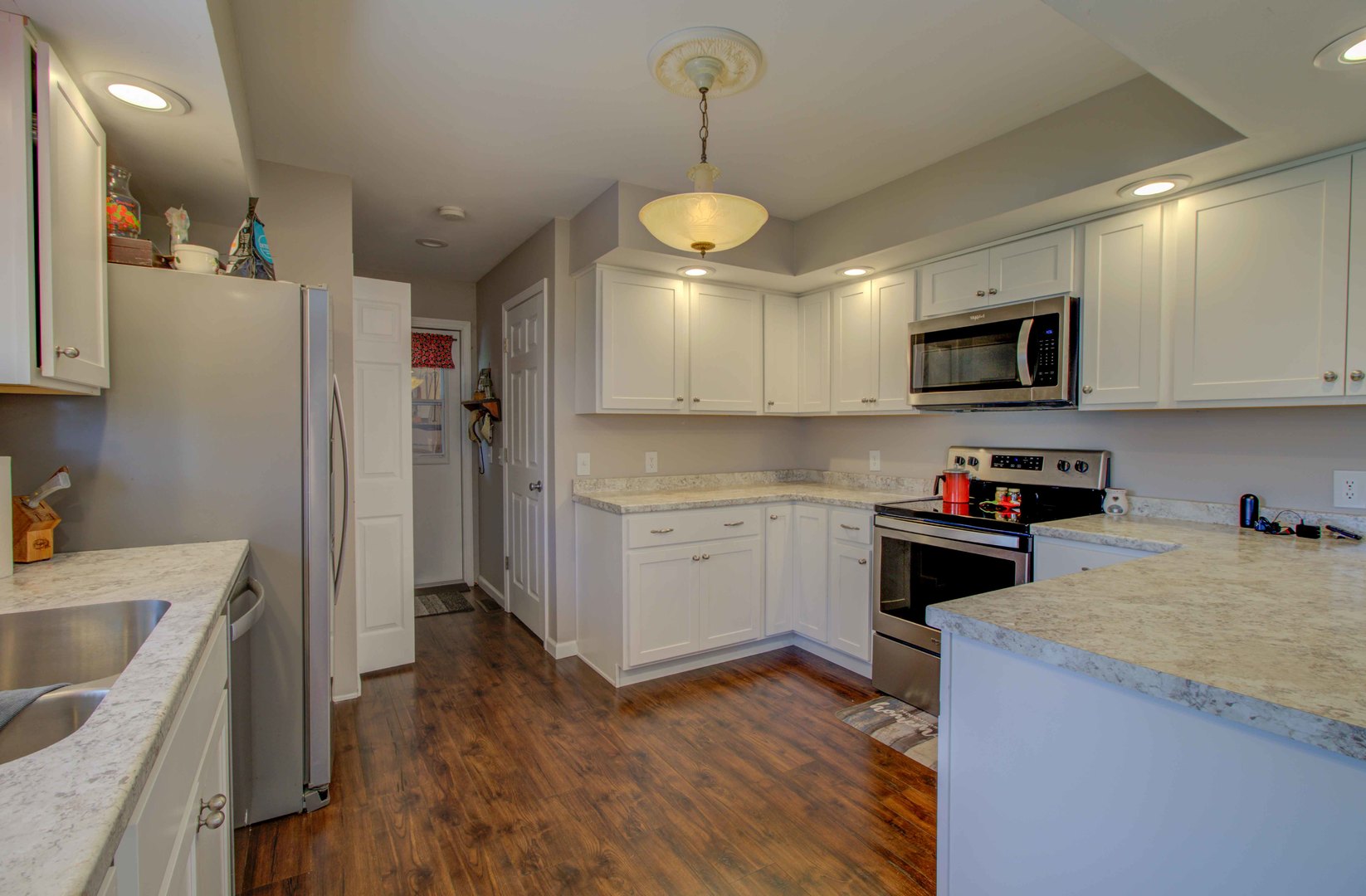 217 Eldorado Drive Tuscola, IL 61953 - Photo 15 of 26 a kitchen with a stove a sink and a refrigerator