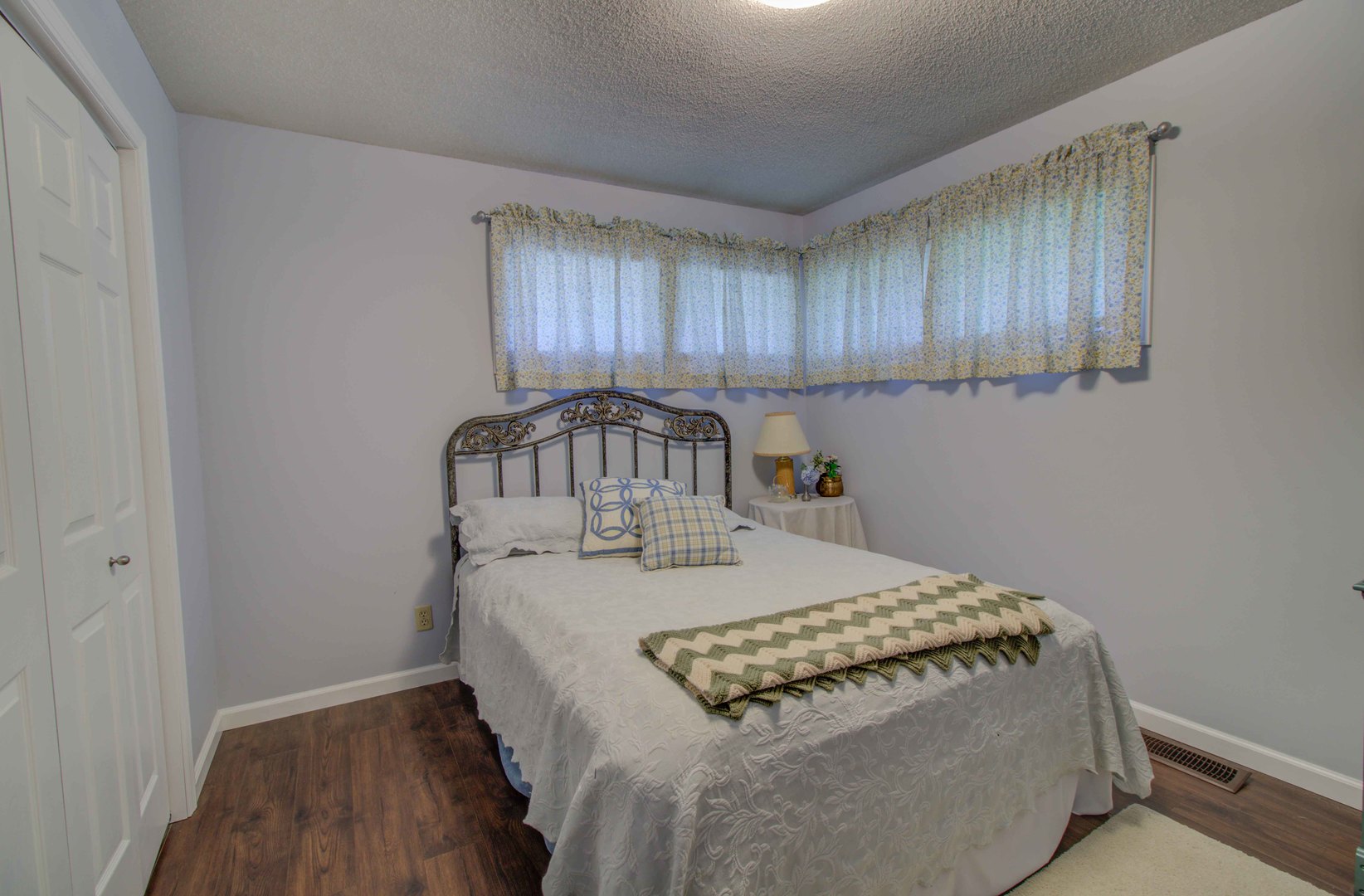 217 Eldorado Drive Tuscola, IL 61953 - Photo 25 of 26 a bedroom with a bed and a window