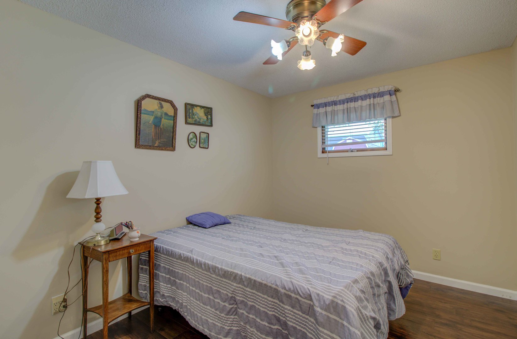 217 Eldorado Drive Tuscola, IL 61953 - Photo 26 of 26 a bedroom with a bed and a lamp