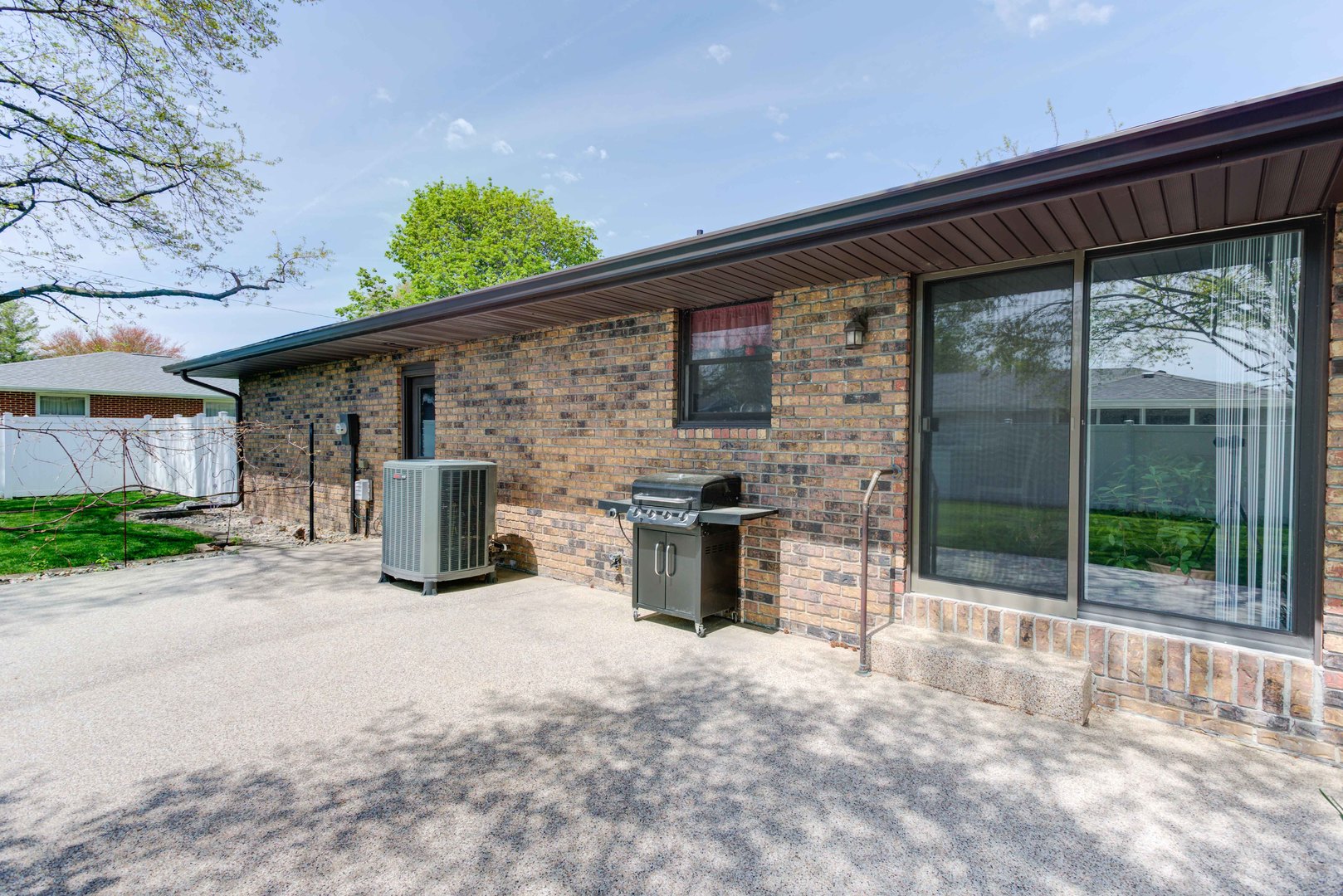 217 Eldorado Drive Tuscola, IL 61953 - Photo 6 of 26 a backyard of a house with yard barbeque oven and outdoor seating