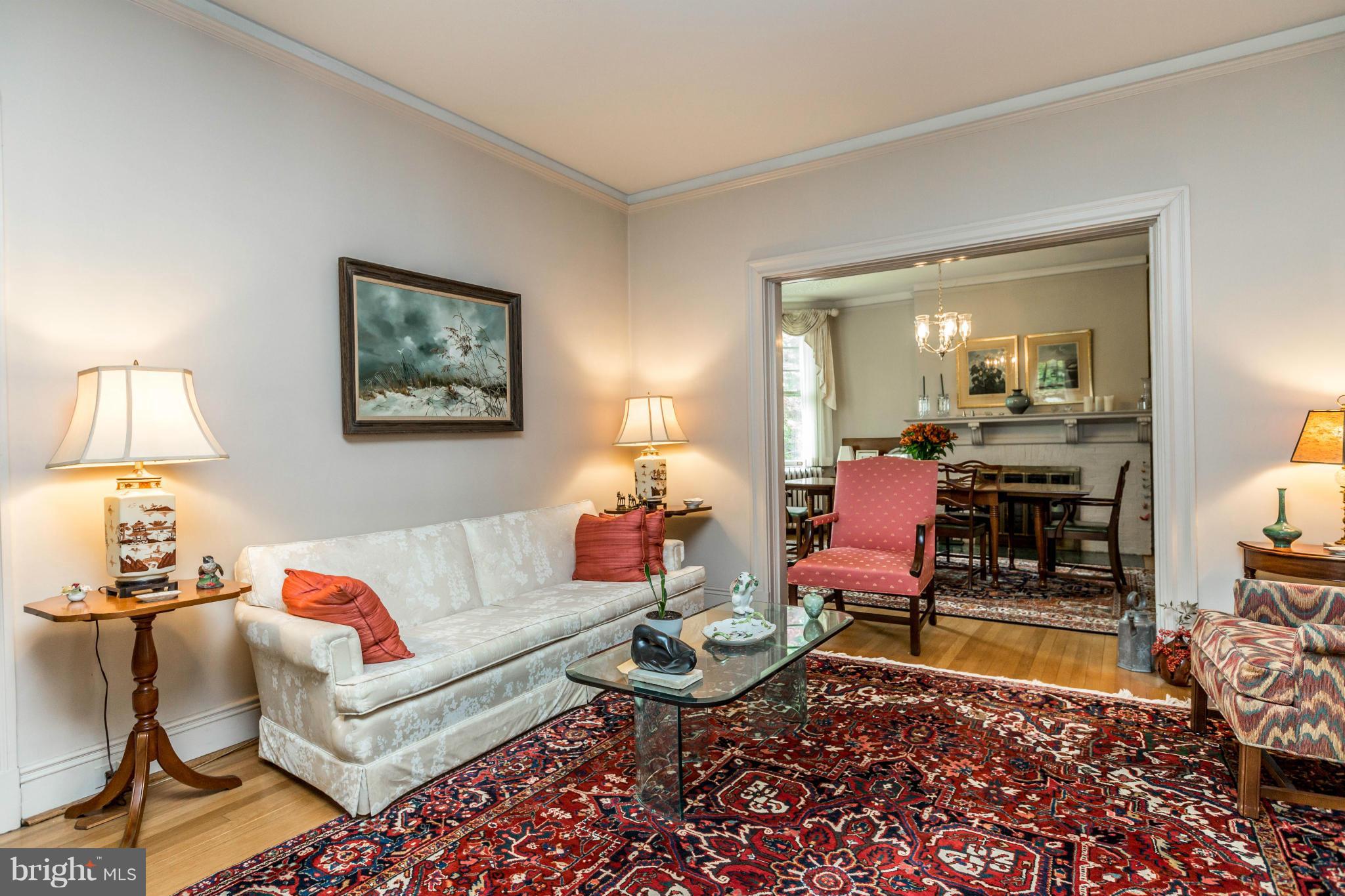 6 Beechdale Road Baltimore, MD 21210 - Photo 7 of 30 a living room with furniture a rug and a lamp