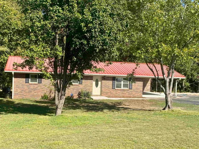 a house view with a swimming pool