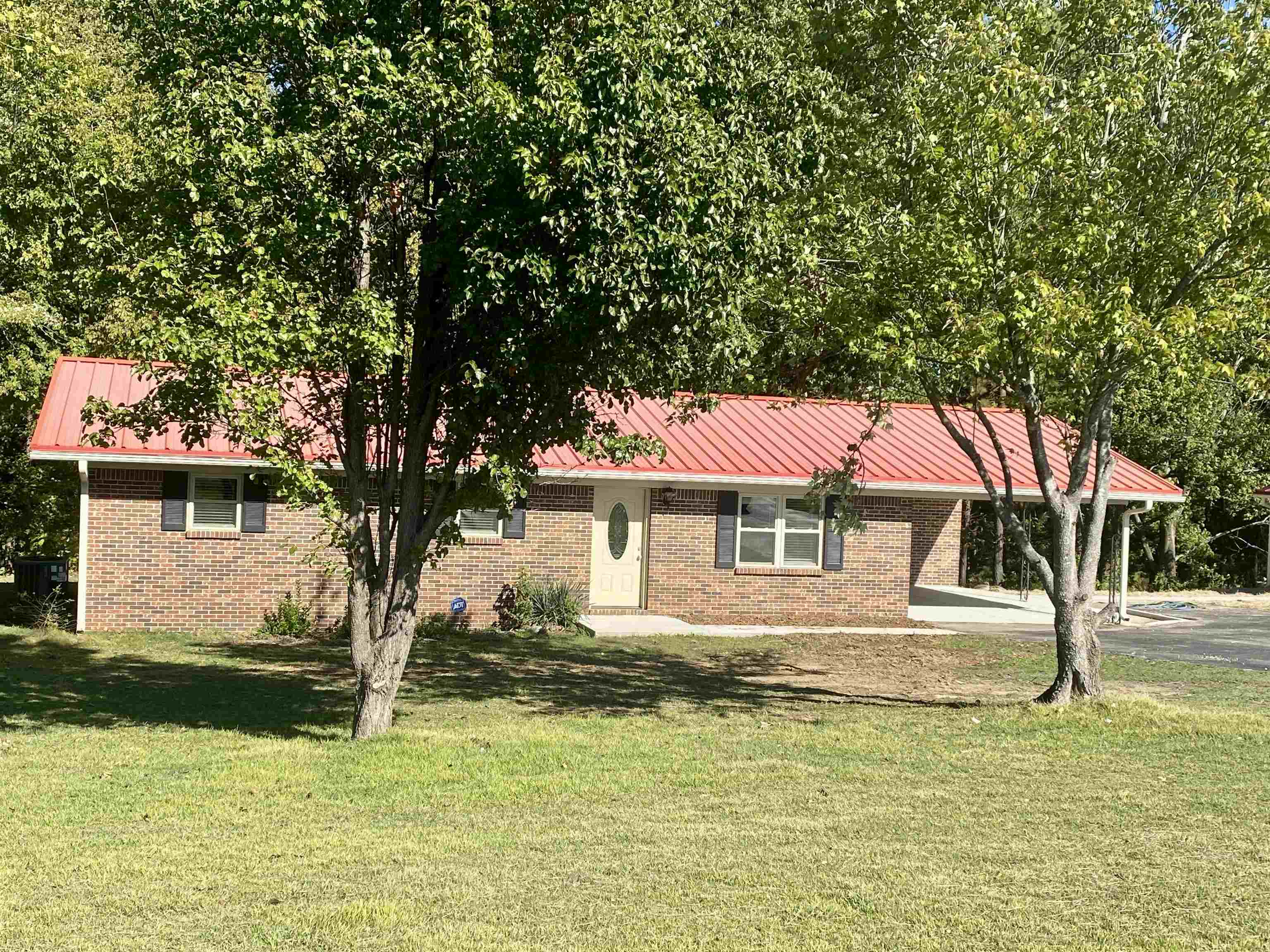 1608 Sam Burlison Road Burlison, TN 38015 - Photo 20 of 25 a house view with a swimming pool