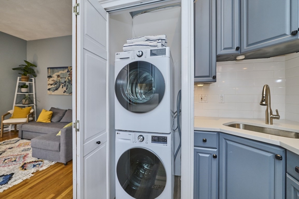 516 Shawmut Avenue, Unit 2 Boston, MA 02118 - Photo 13 of 13 a view of a kitchen with washer and dryer