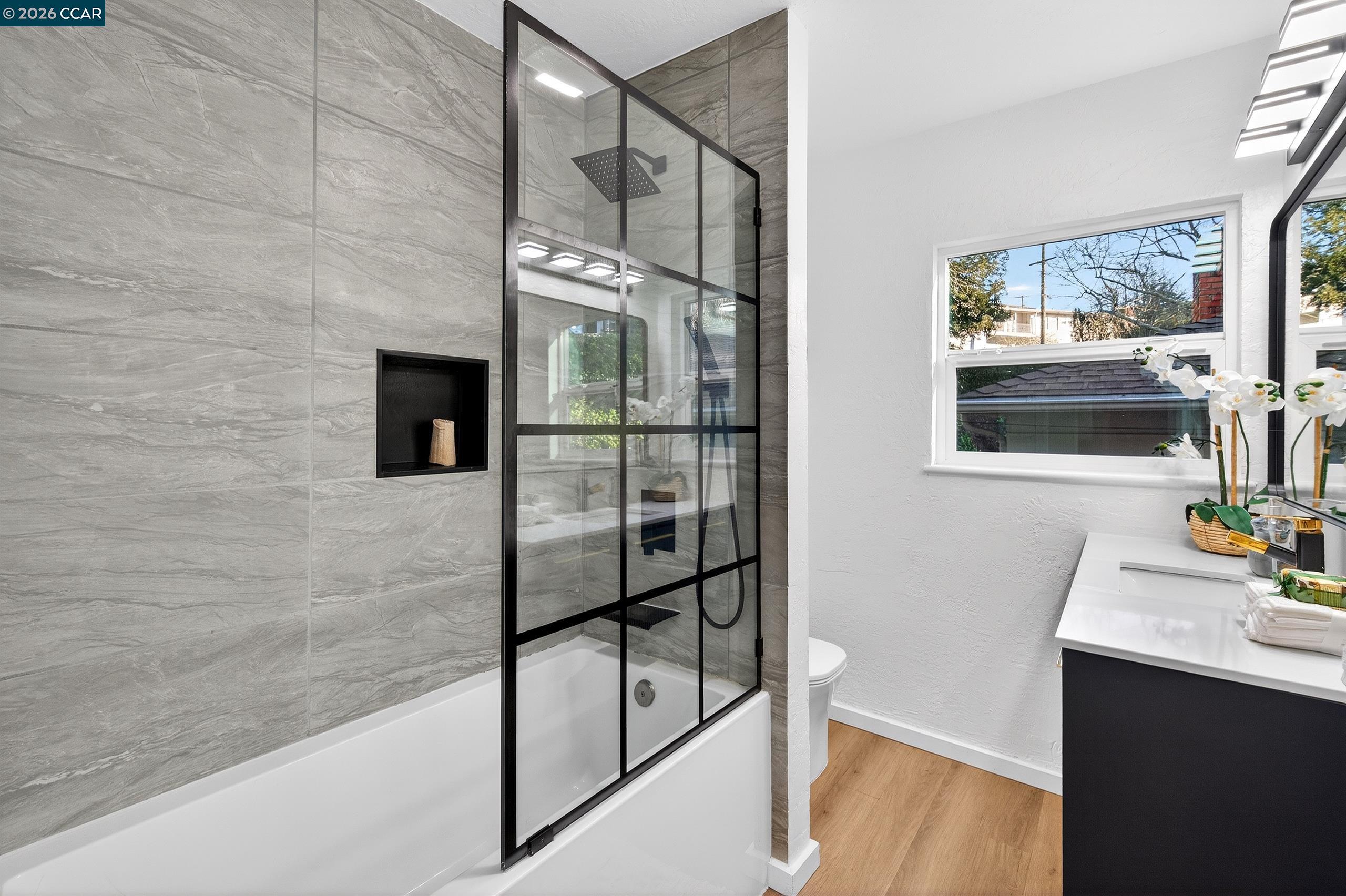 230 Fairlawn Drive Berkeley, CA 94708 - Photo 24 of 58 a bathroom with a sink and a mirror