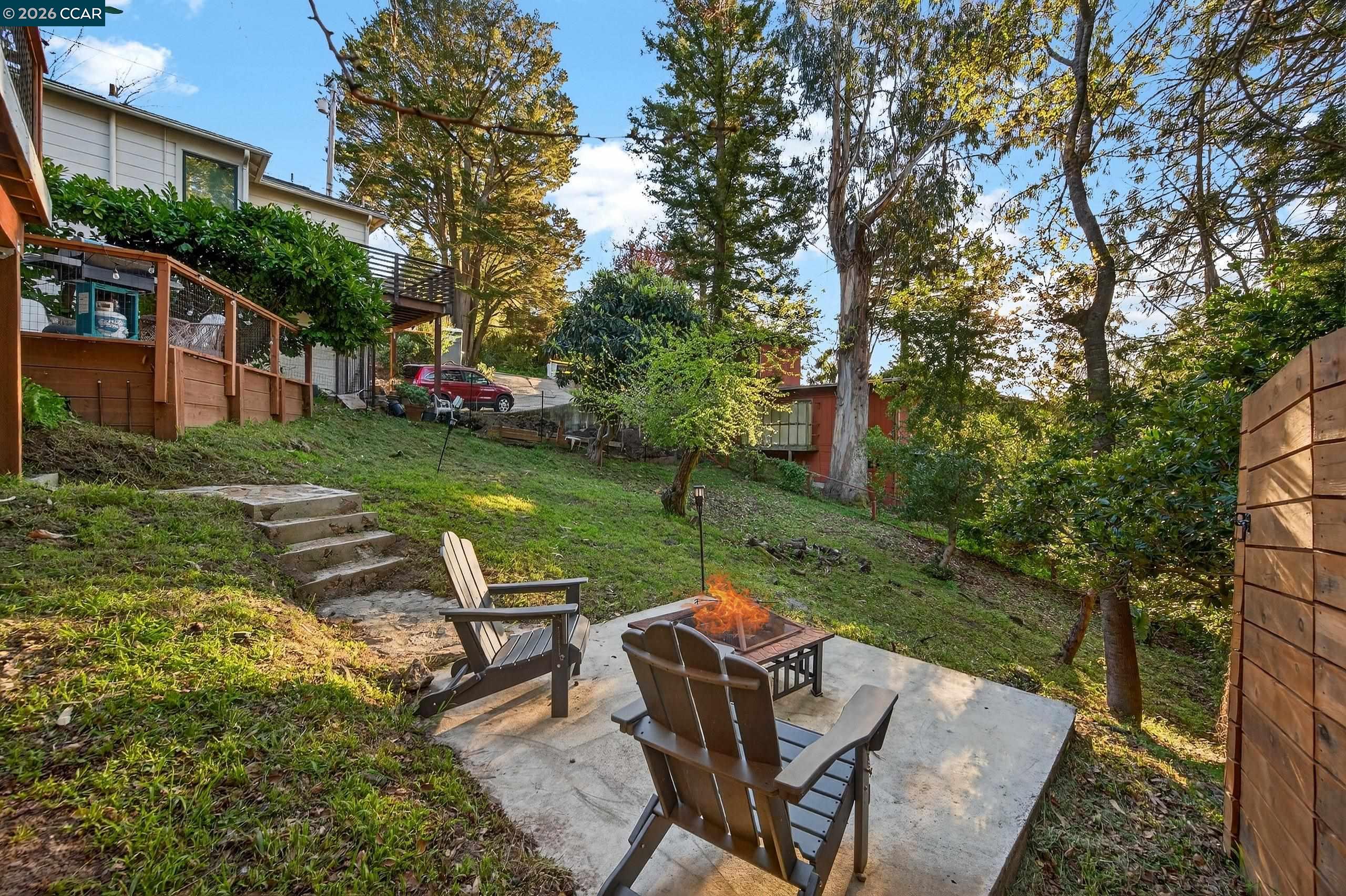 230 Fairlawn Drive Berkeley, CA 94708 - Photo 42 of 58 a view of a table and chairs in the garden