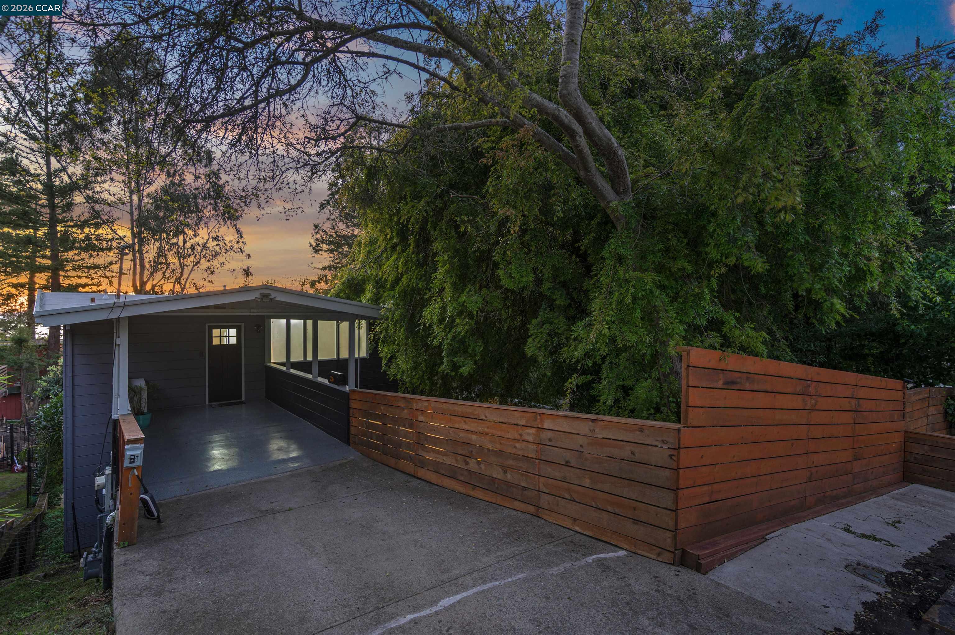 230 Fairlawn Drive Berkeley, CA 94708 - Photo 52 of 58 a side view of a house with a yard