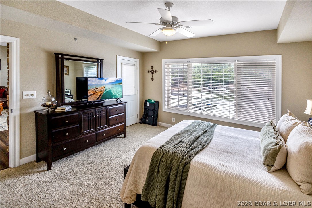 68 Lighthouse Road, Unit 121 Lake Ozark, MO 65049 - Photo 9 of 30 Master bedroom.