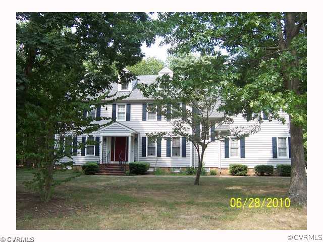 13001 Rivers Bend Road Chester, VA 23836 - Photo 2 of 12 a front view of a house with a garden
