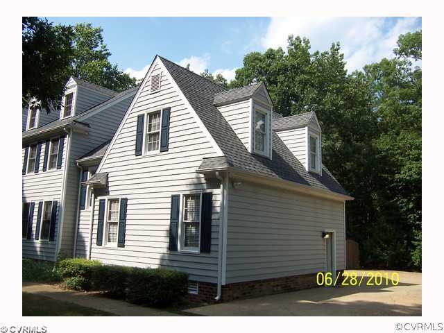 13001 Rivers Bend Road Chester, VA 23836 - Photo 3 of 12 a view of a house with a yard