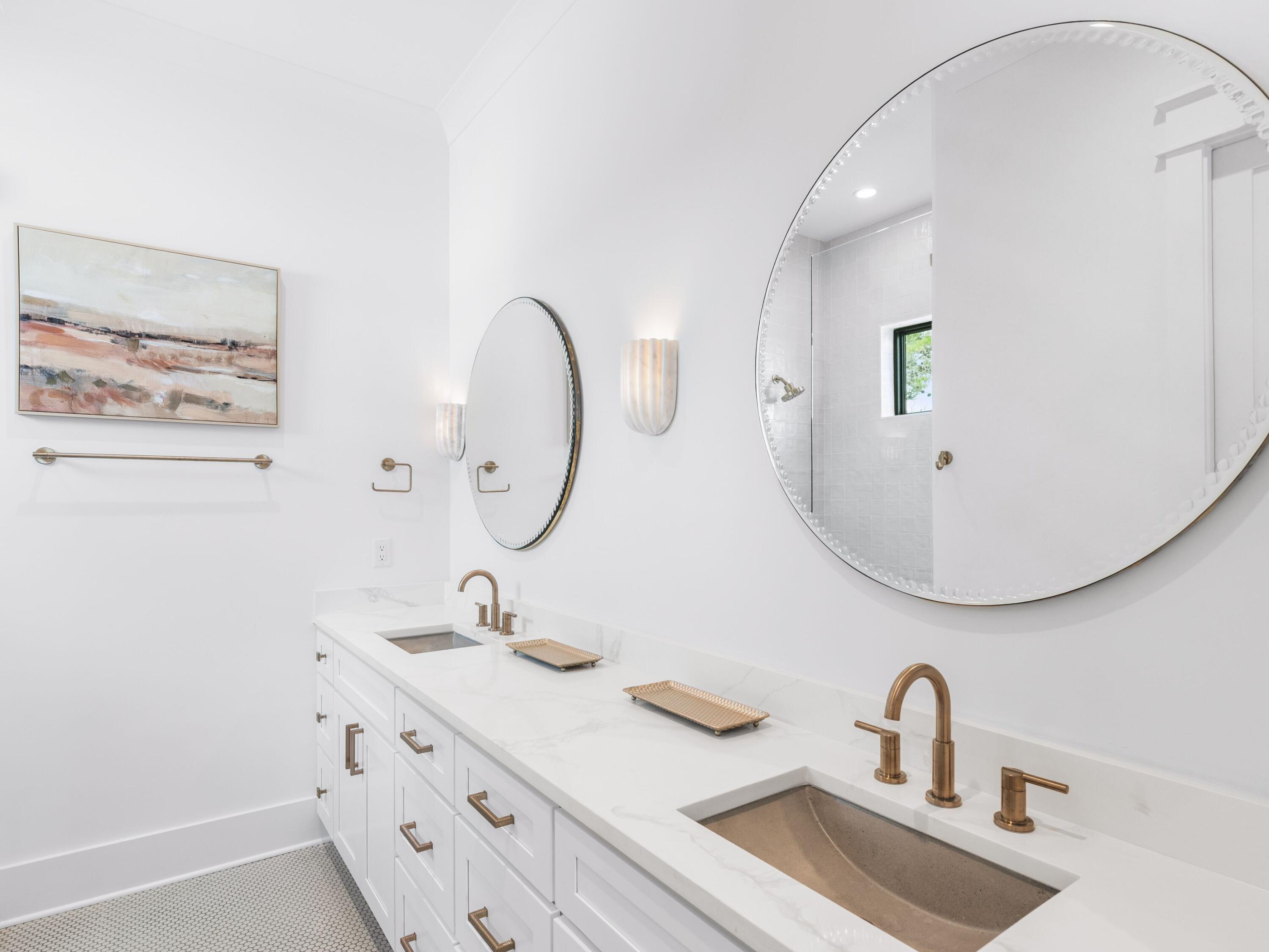 394 Grande Pointe Cir Inlet Beach Inlet Beach, FL 32461 - Photo 24 of 54 a bathroom with a sink and a mirror
