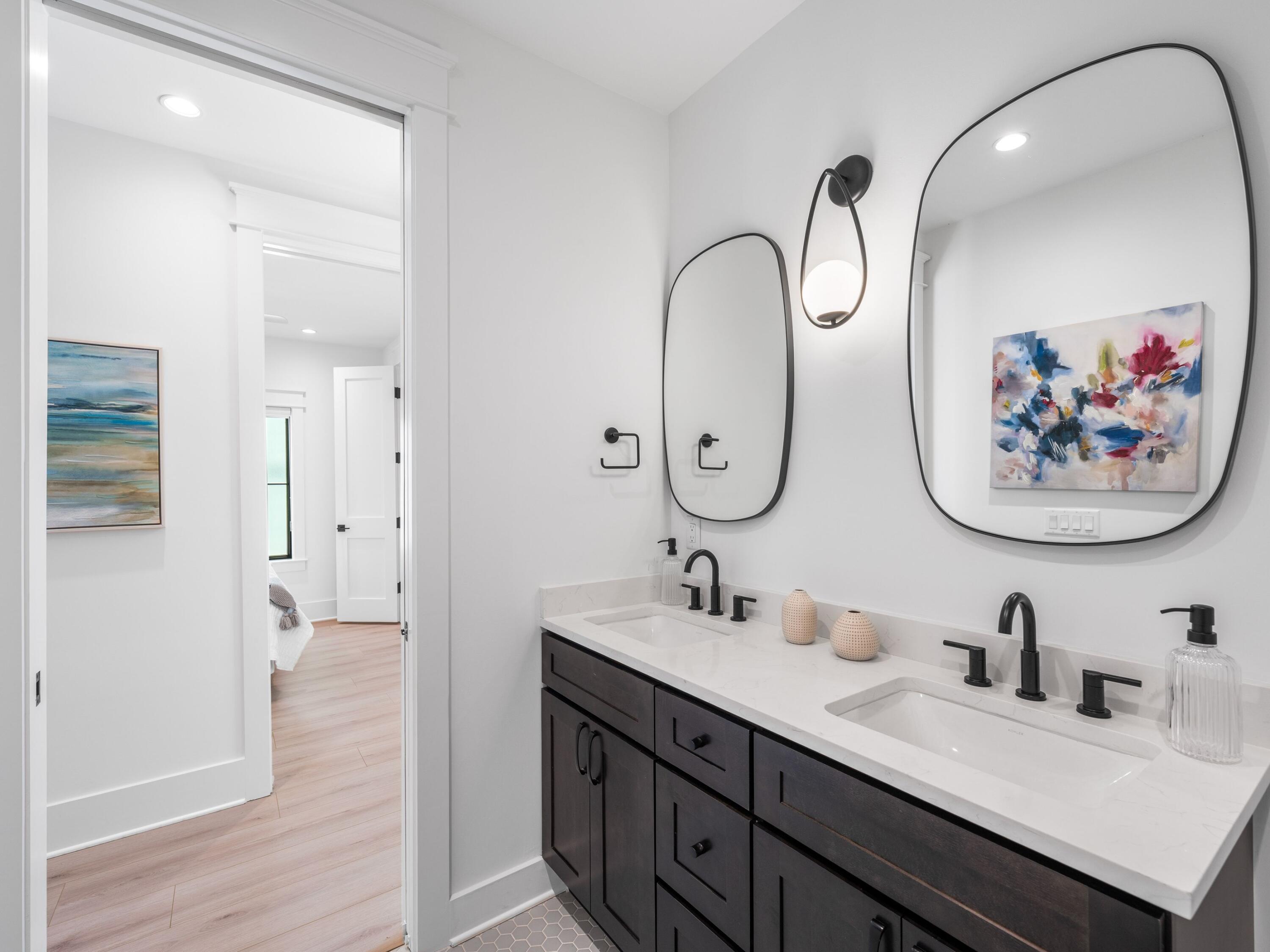 394 Grande Pointe Cir Inlet Beach Inlet Beach, FL 32461 - Photo 28 of 54 a bathroom with 2 sink and a mirror