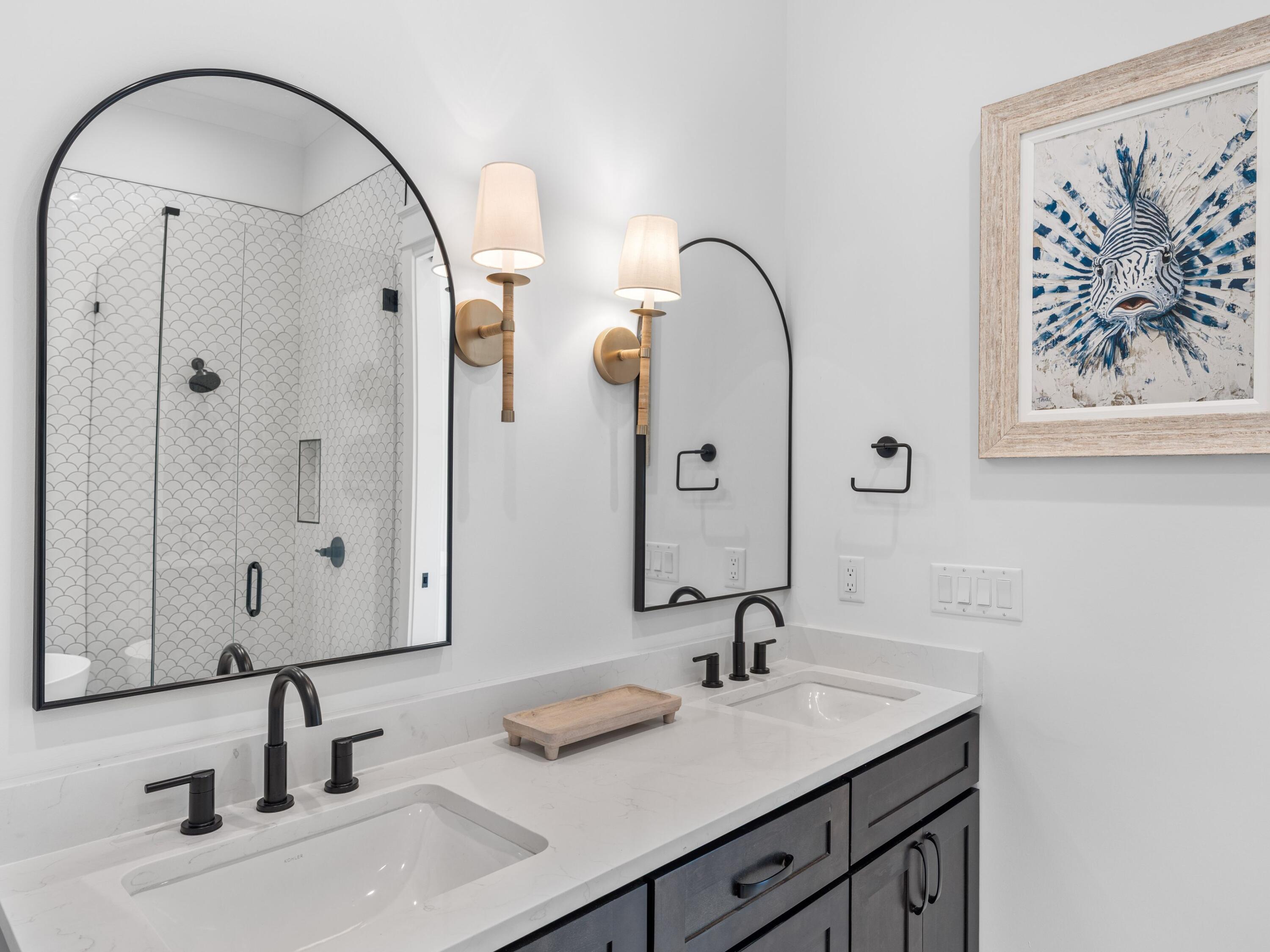 394 Grande Pointe Cir Inlet Beach Inlet Beach, FL 32461 - Photo 34 of 54 a bathroom with a sink and a mirror