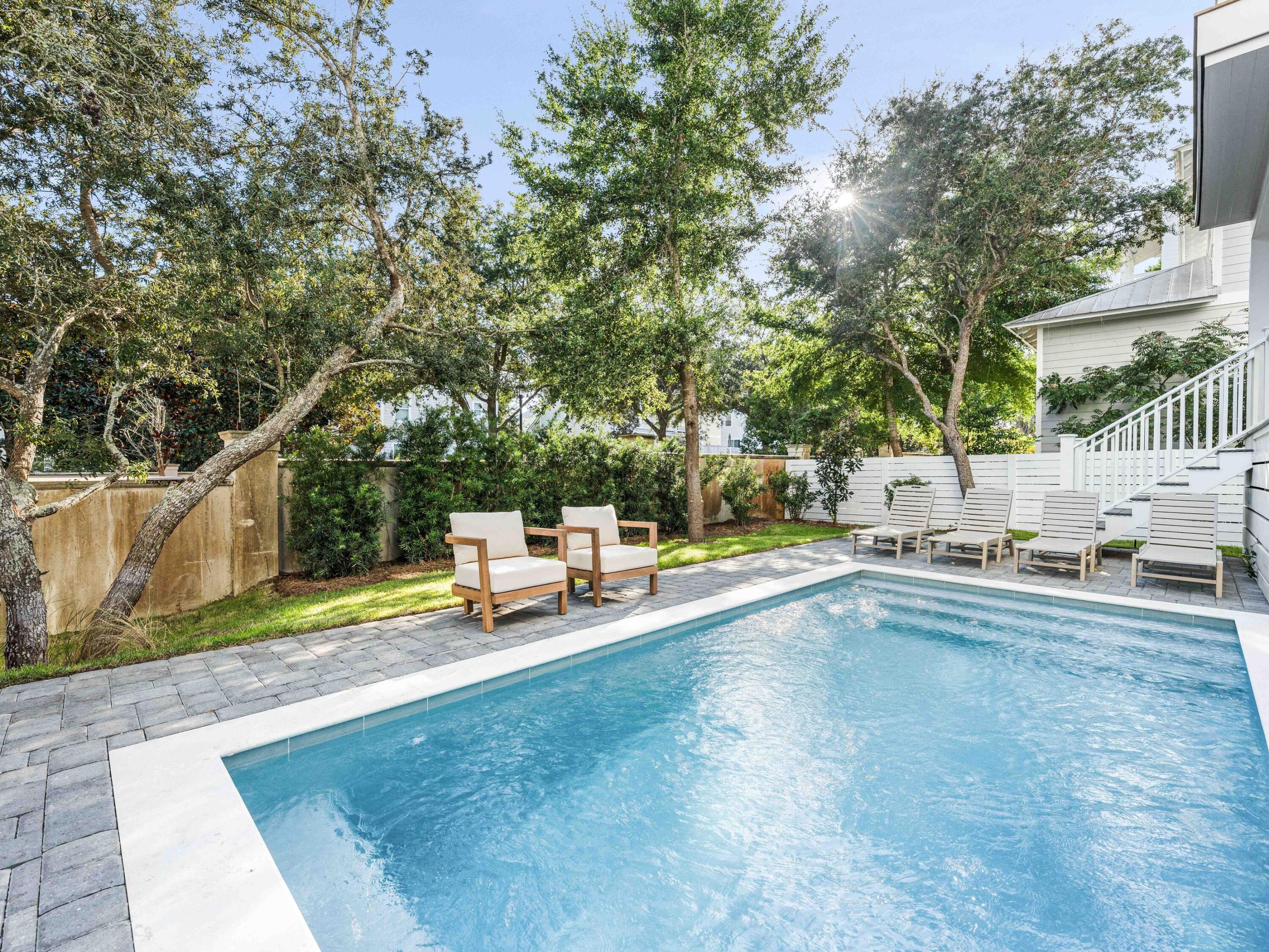 394 Grande Pointe Cir Inlet Beach Inlet Beach, FL 32461 - Photo 4 of 54 a view of a swimming pool with a patio and a yard