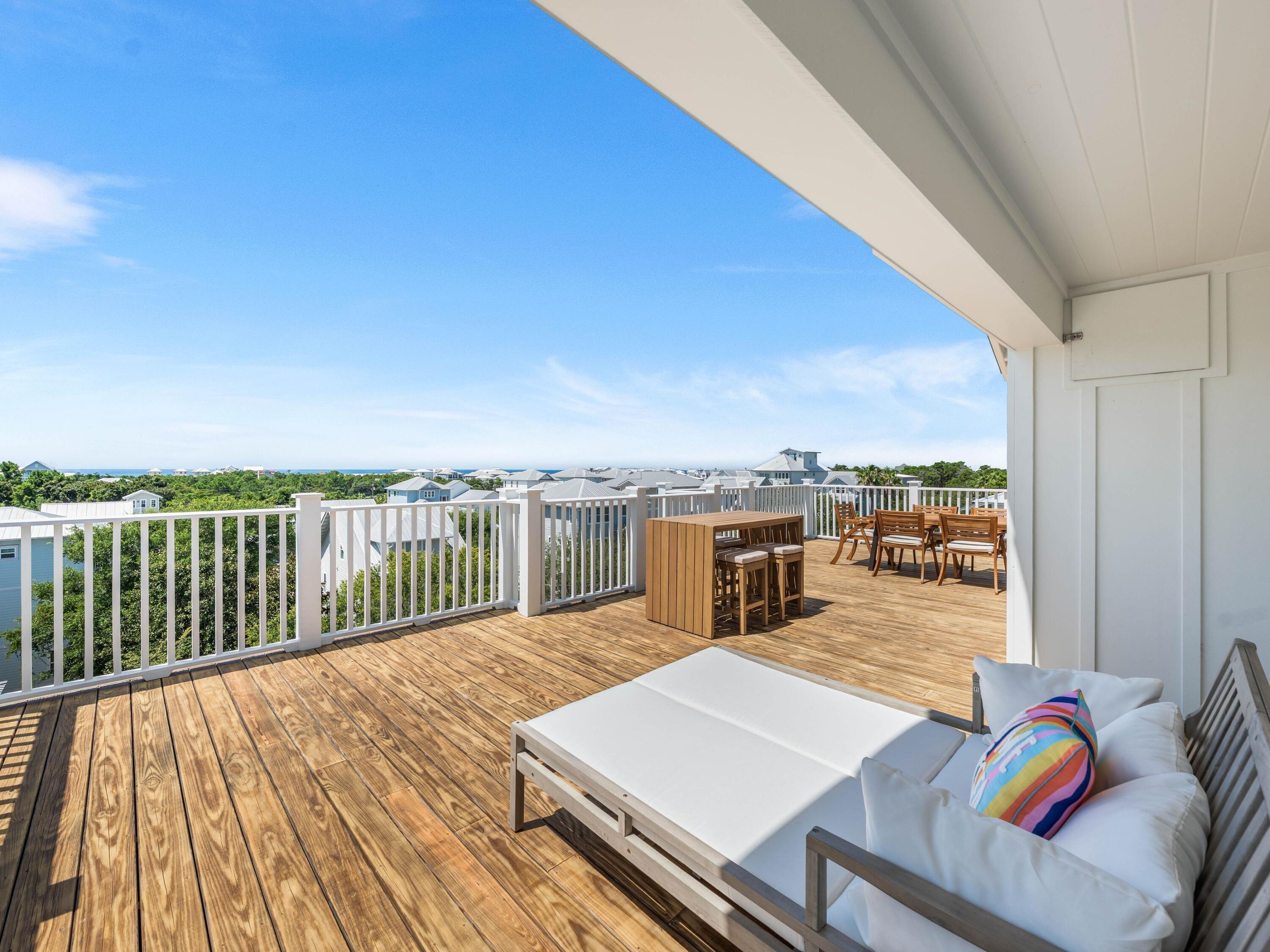 394 Grande Pointe Cir Inlet Beach Inlet Beach, FL 32461 - Photo 48 of 54 a view of a balcony with a patio