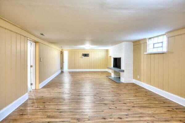 3701 Monroe Street Gary, IN 46408 - Photo 15 of 22 a view of an empty room with wooden floor and a window